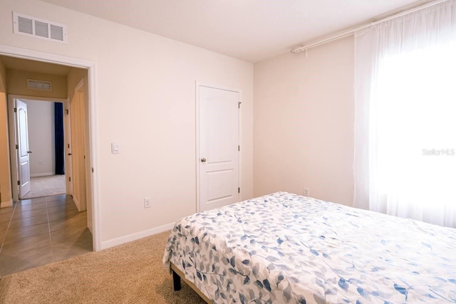 bedroom featuring carpet flooring