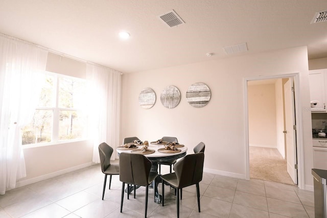 view of tiled dining space