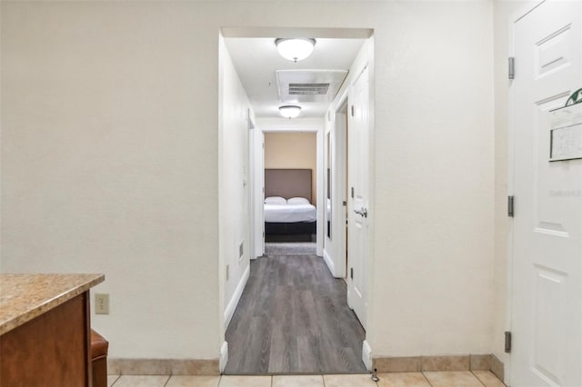 corridor with tile patterned floors