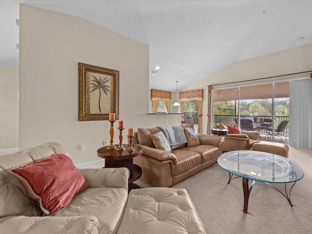 living room featuring lofted ceiling and carpet flooring