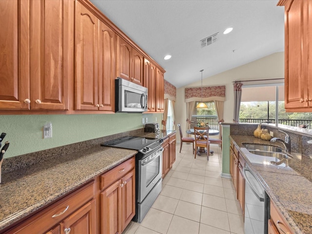 kitchen featuring light tile patterned floors, stone countertops, vaulted ceiling, sink, and electric range