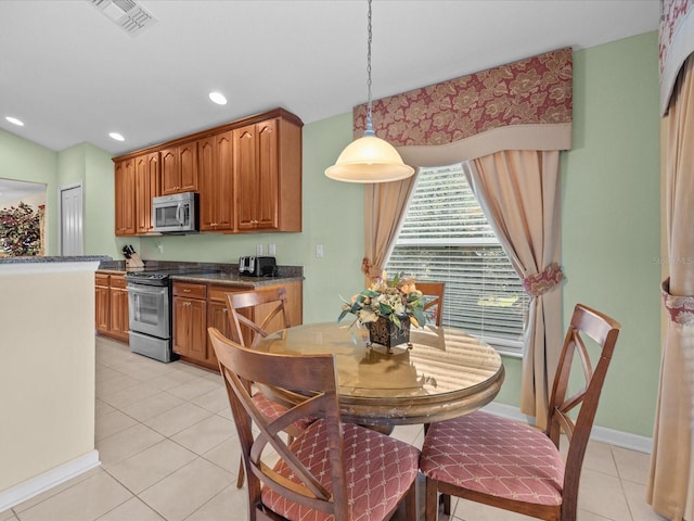 view of tiled dining space