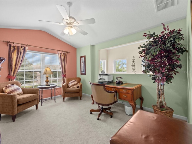 office space with ceiling fan, carpet flooring, and vaulted ceiling