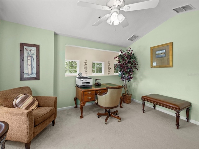 carpeted office with ceiling fan and lofted ceiling