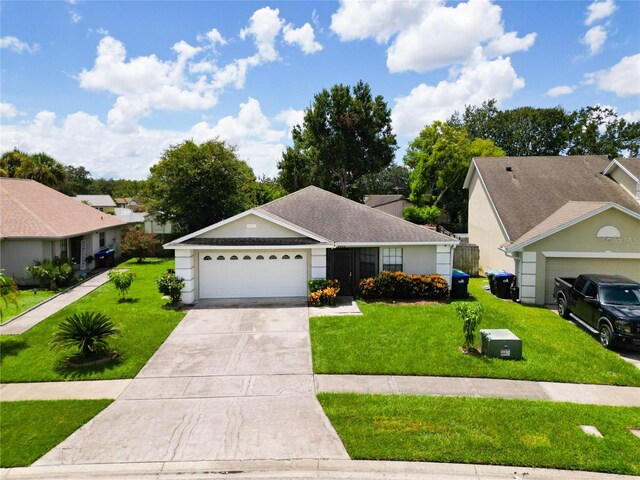 ranch-style house featuring a front lawn and a garage