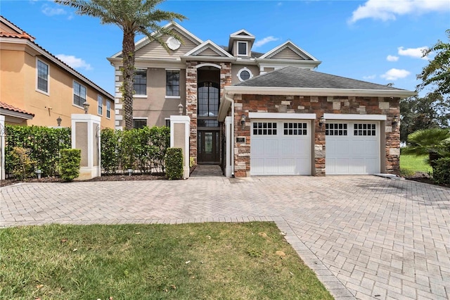 view of front of property with a garage