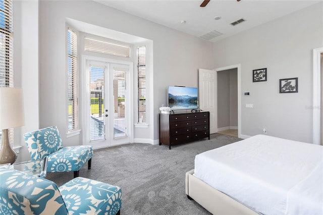 bedroom with ceiling fan, french doors, light carpet, and access to exterior