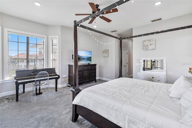 carpeted bedroom with ceiling fan