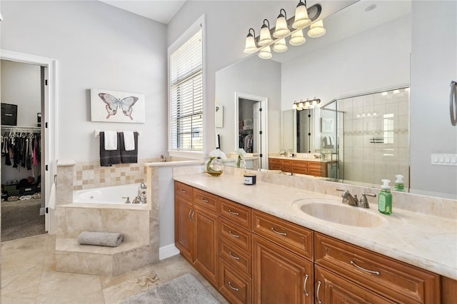 bathroom with vanity, separate shower and tub, and tile patterned flooring