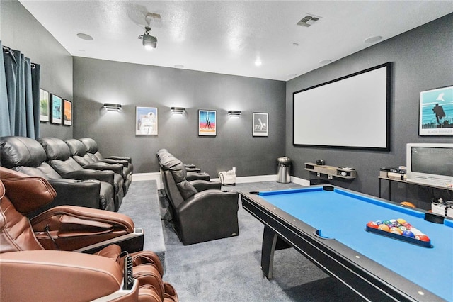 home theater room with pool table, a textured ceiling, and carpet floors