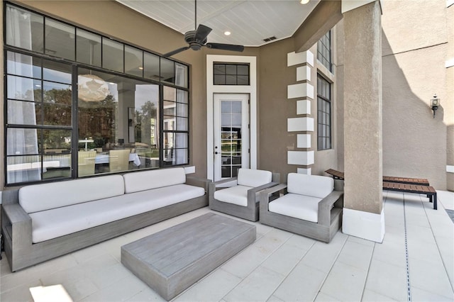 view of patio with french doors and ceiling fan