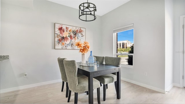 dining space featuring light hardwood / wood-style floors