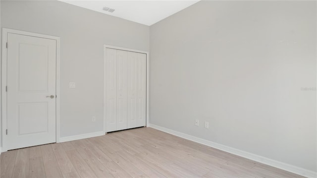 unfurnished bedroom featuring light hardwood / wood-style floors