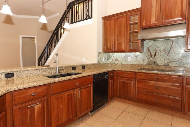 kitchen with decorative light fixtures, light stone counters, sink, black appliances, and light tile patterned flooring