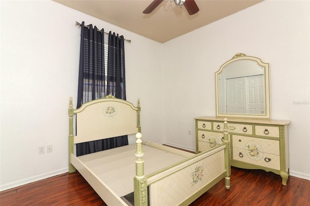 bedroom with ceiling fan and dark hardwood / wood-style floors