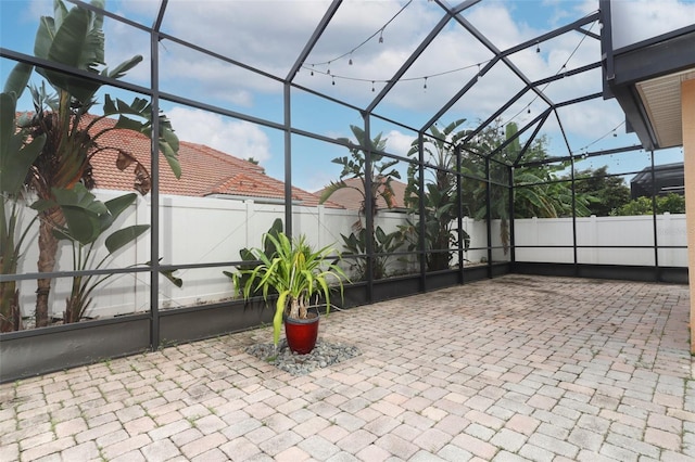 view of patio / terrace with glass enclosure