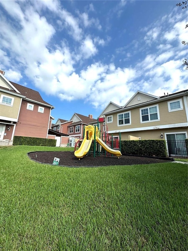 view of playground featuring a yard