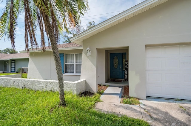 entrance to property with a garage