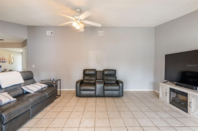 tiled living room featuring ceiling fan