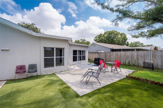 view of yard with a patio area