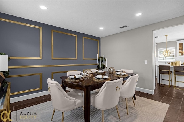 dining room featuring dark wood-type flooring