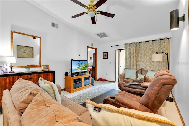 tiled living room featuring lofted ceiling and ceiling fan