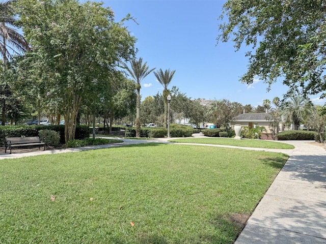 view of home's community featuring a lawn