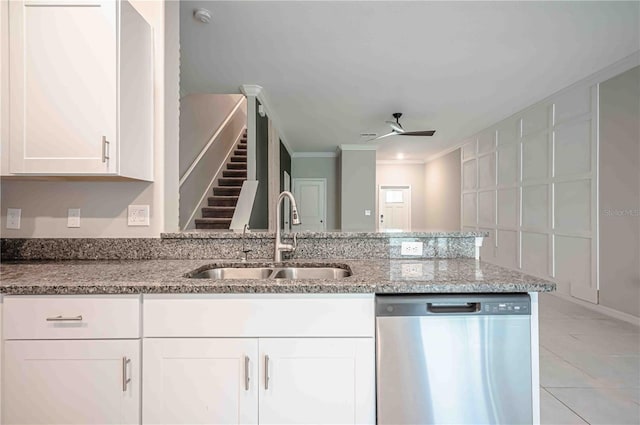 kitchen with crown molding, dishwasher, light stone countertops, ceiling fan, and sink