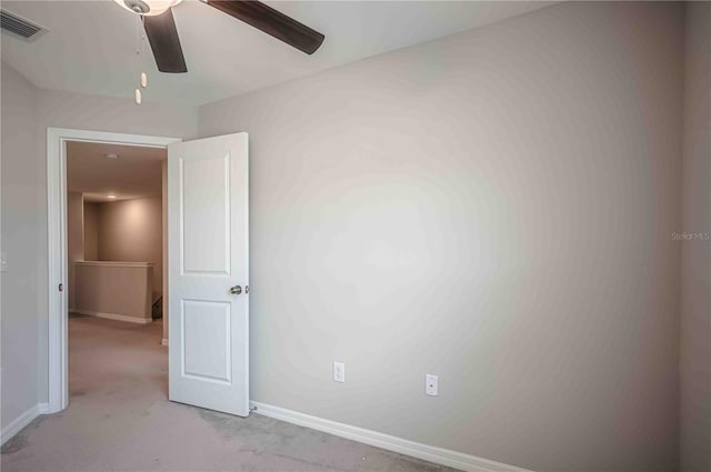 unfurnished room featuring carpet flooring and ceiling fan