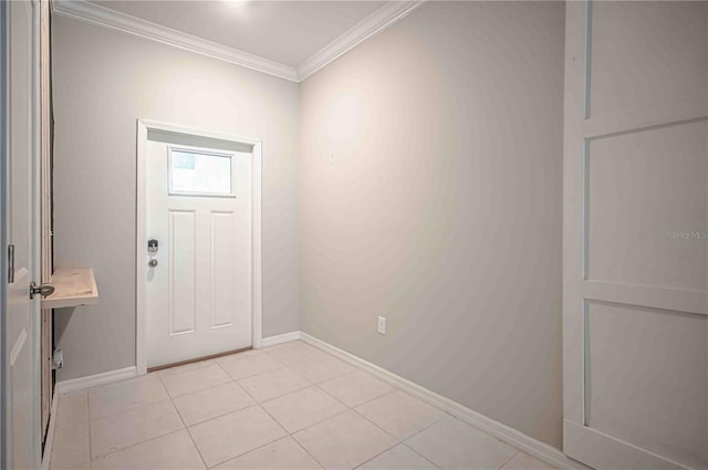 tiled foyer entrance with ornamental molding