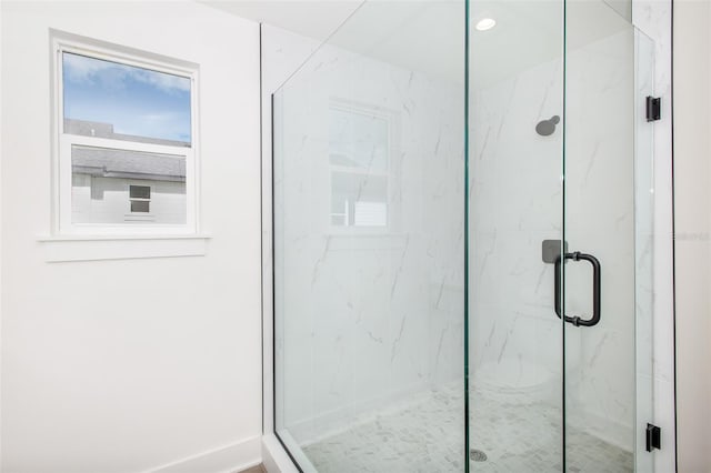 bathroom featuring an enclosed shower