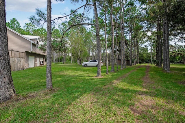 view of yard with a garage