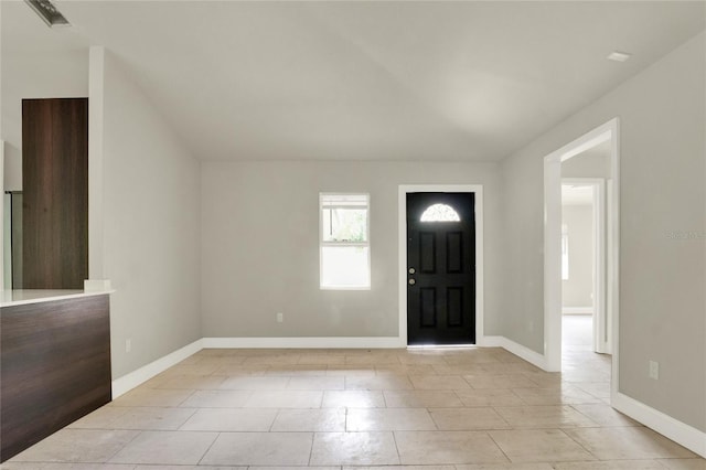 entrance foyer featuring light tile patterned floors