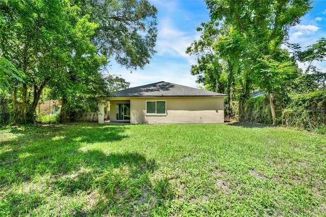 exterior space with a lawn