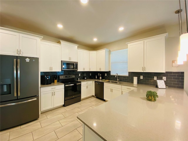 kitchen with decorative light fixtures, white cabinetry, sink, decorative backsplash, and black appliances