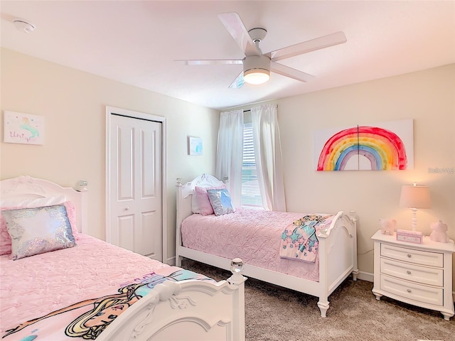 bedroom featuring ceiling fan and carpet flooring