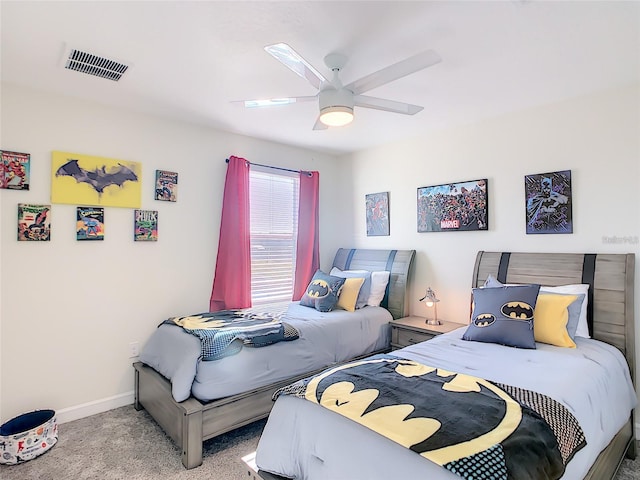 bedroom featuring ceiling fan and light colored carpet