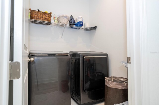 laundry area featuring separate washer and dryer