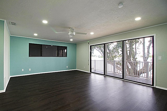 empty room featuring a textured ceiling, crown molding, ceiling fan, and dark hardwood / wood-style flooring