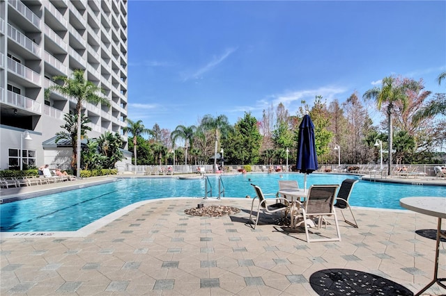 view of swimming pool featuring a patio