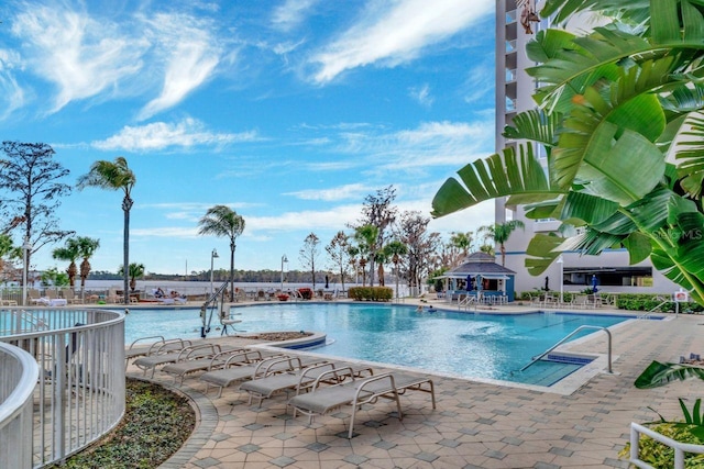 view of pool featuring a gazebo and a patio