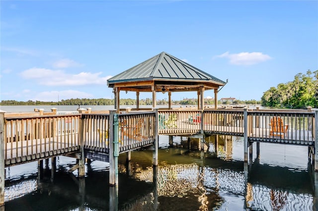 dock area featuring a gazebo and a water view