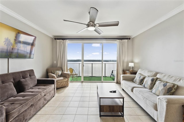 living room with light tile patterned floors, crown molding, ceiling fan, and a water view