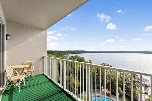 balcony featuring a water view