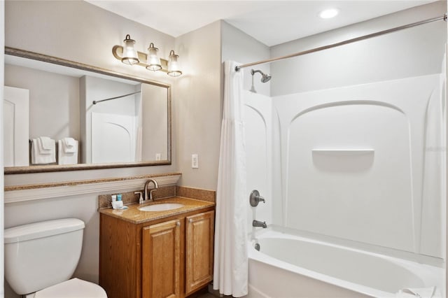 full bathroom with vanity, toilet, and shower / bath combo