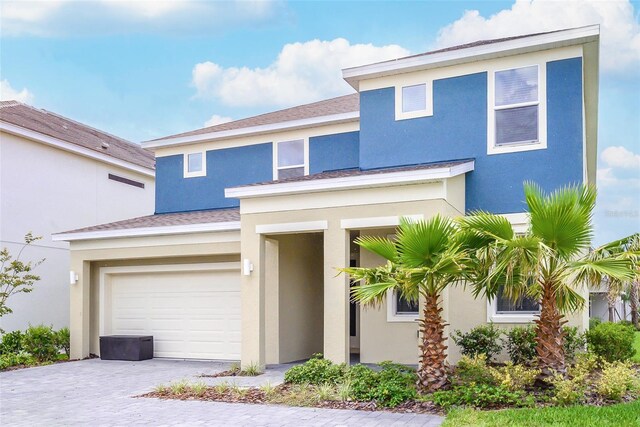 view of front of property featuring a garage