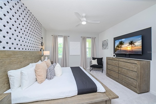 carpeted bedroom featuring a ceiling fan