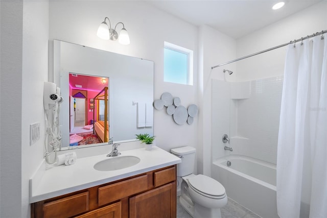 ensuite bathroom featuring shower / tub combo, vanity, toilet, and connected bathroom