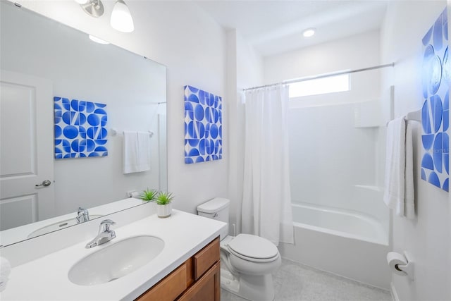 full bathroom with vanity, toilet, and shower / tub combo with curtain