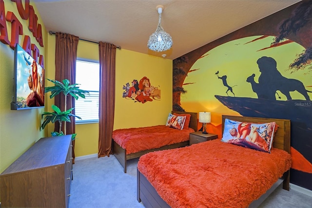 bedroom with carpet flooring, a textured ceiling, and baseboards